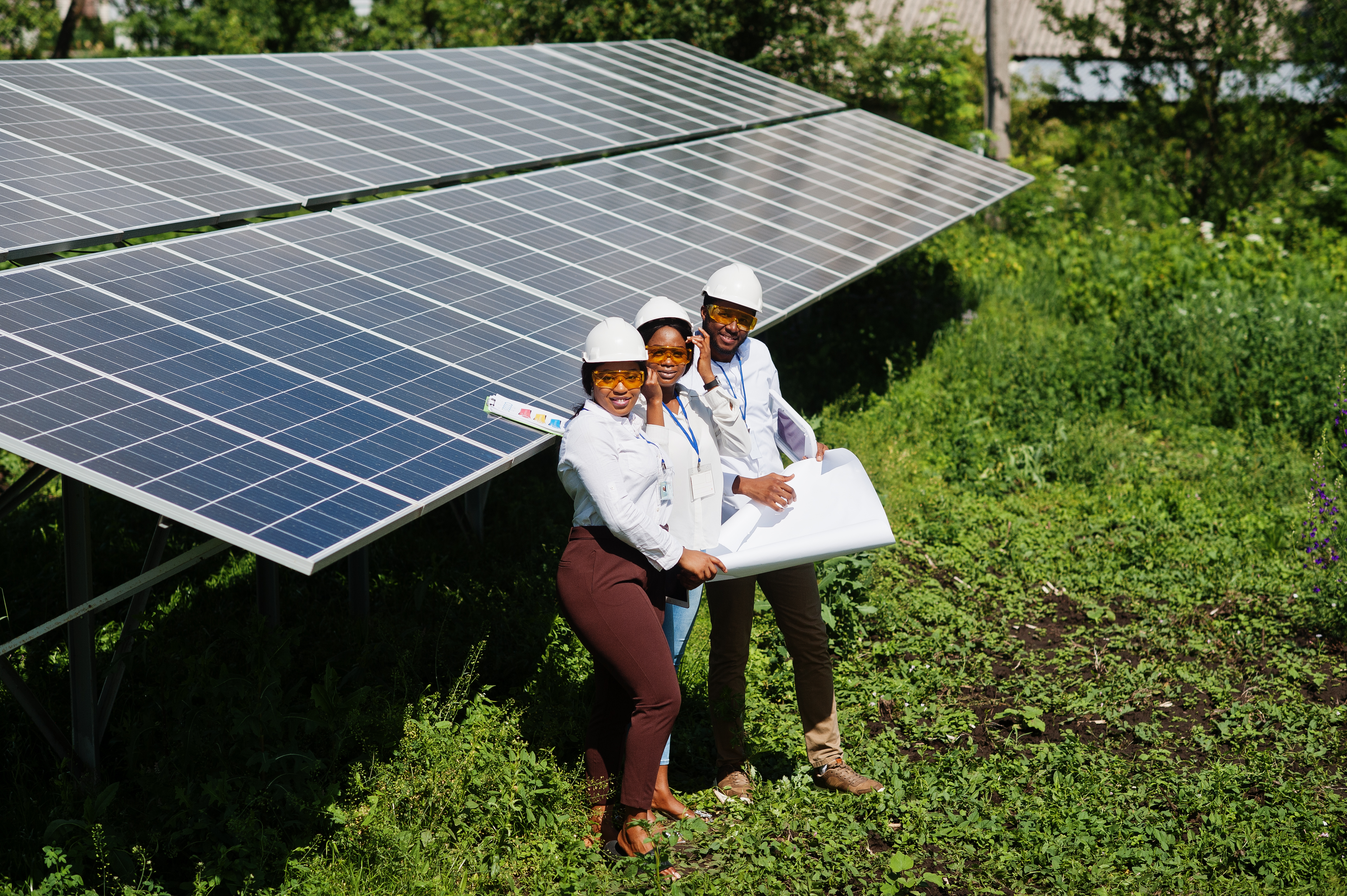 Home african american technician checks the maintenance of the solar